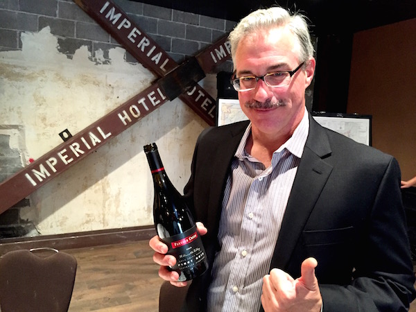 Tony Rynders has fun touting one of the 2013 single-vineyard wines he  created for Panther Creek Cellars.
